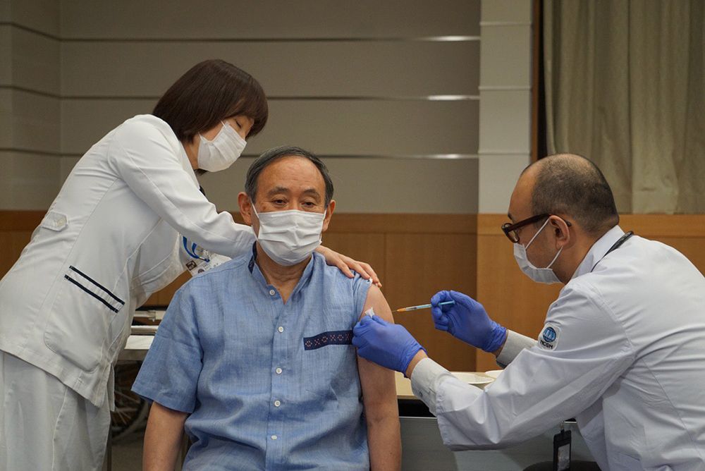 Japan’s Suga Gets COVID-19 Vaccine Ahead of U.S. Visit